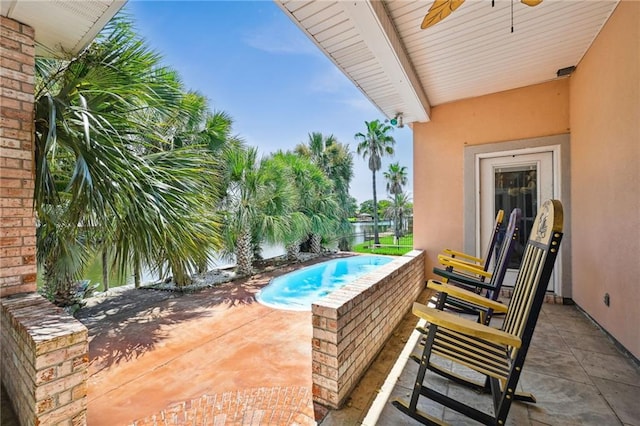 104 Inlet Dr, Slidell, LA 70458 - view of patio / terrace with ceiling fan and an outdoor pool