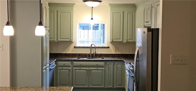 2641 Long Branch Dr, Marrero, LA 70072 - kitchen with freestanding refrigerator, range, decorative light fixtures, and ornamental molding