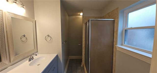 2641 Long Branch Dr, Marrero, LA 70072 - full bathroom featuring vanity, a shower stall, plenty of natural light, and tile patterned floors