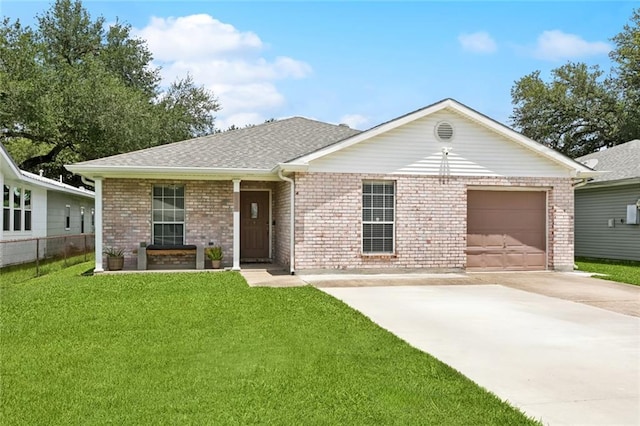 834 Mongrue St, Luling, LA 70070 - ranch-style house with a garage, driveway, a front lawn, brick siding, and roof with shingles