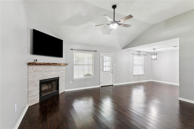 834 Mongrue St, Luling, LA 70070 - unfurnished living room featuring vaulted ceiling, a fireplace, wood finished floors, and ceiling fan