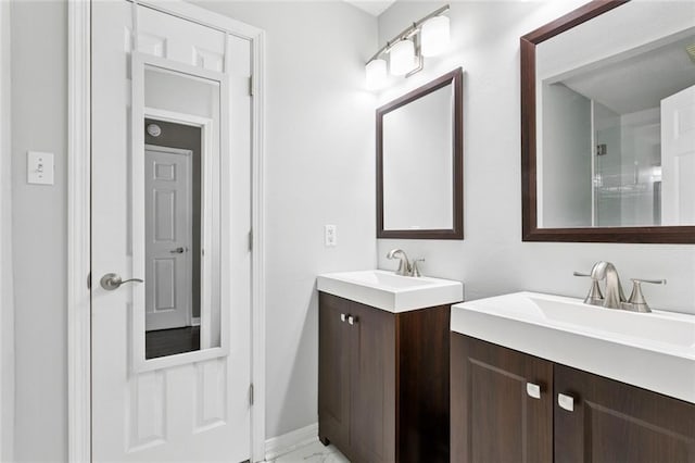 834 Mongrue St, Luling, LA 70070 - full bath featuring two vanities and marble look tiles
