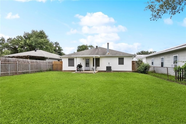 834 Mongrue St, Luling, LA 70070 - back of house featuring a fenced backyard and a patio