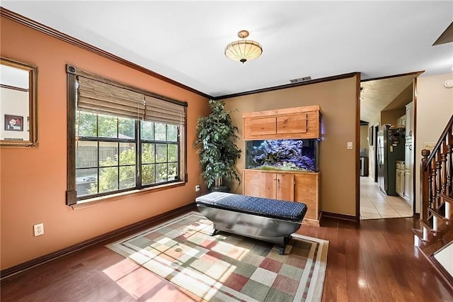 201 Milbank Ln, Pearl River, LA 70452 - sitting room with stairs, hardwood / wood-style floors, and crown molding