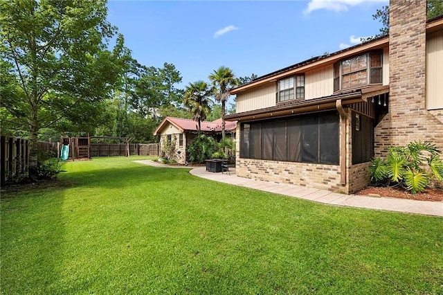 201 Milbank Ln, Pearl River, LA 70452 - fenced backyard with a sunroom and a playground