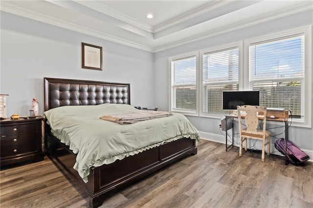 218 Belle Ormond Cir, Destrehan, LA 70047 - bedroom with crown molding, wood finished floors, a tray ceiling, and recessed lighting