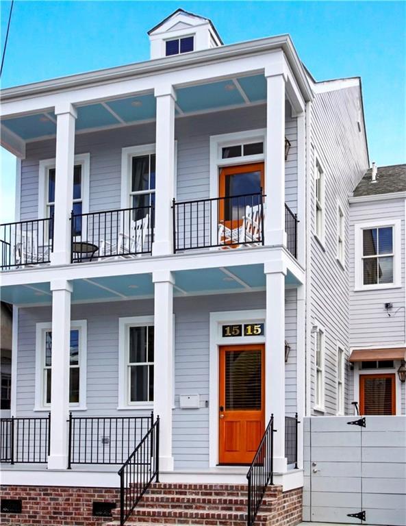 1515 St Ann St, New Orleans, LA 70116 - view of front of house featuring a balcony and a porch