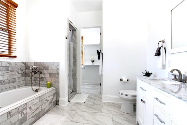 1515 St Ann St, New Orleans, LA 70116 - bathroom with vanity, a bath, a shower stall, and marble finish floors