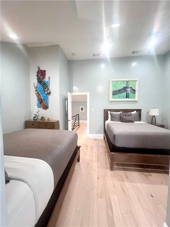 1515 St Ann St, New Orleans, LA 70116 - bedroom featuring light wood finished floors