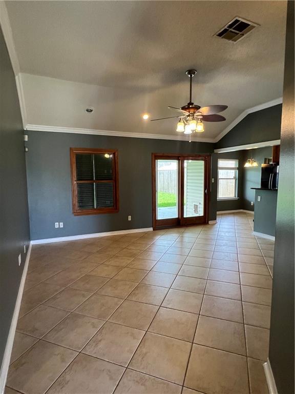 2712 Bayou Bleu Dr, Marrero, LA 70072 - unfurnished living room featuring ornamental molding, ceiling fan, light tile patterned floors, vaulted ceiling, and recessed lighting