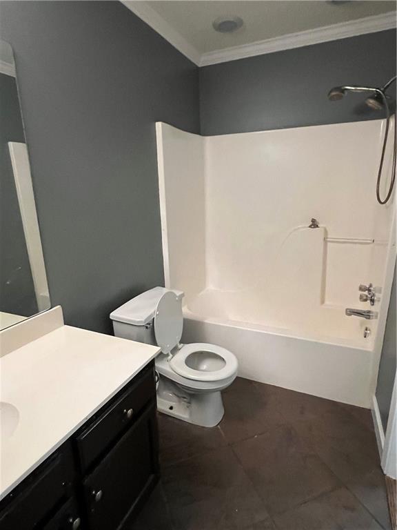 2712 Bayou Bleu Dr, Marrero, LA 70072 - full bath with crown molding, vanity, bathtub / shower combination, and tile patterned flooring