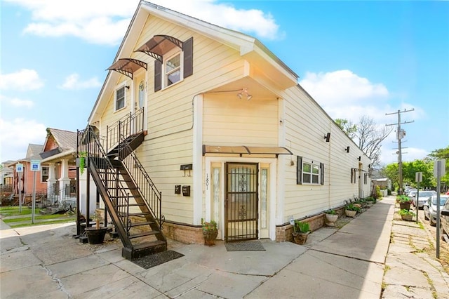 1801 Adams St, New Orleans, LA 70118 - view of front facade with stairs