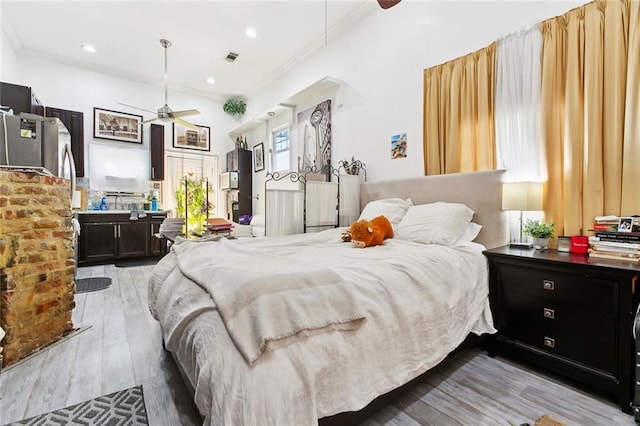 1801 Adams St, New Orleans, LA 70118 - bedroom featuring crown molding, wood finished floors, and recessed lighting