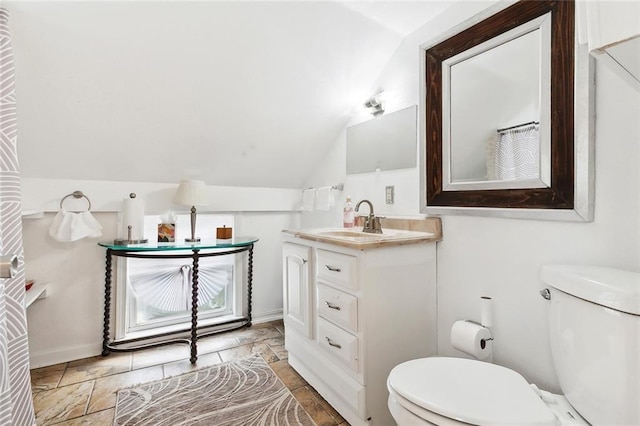 1801 Adams St, New Orleans, LA 70118 - bathroom featuring vaulted ceiling and vanity