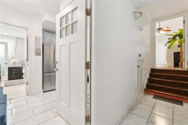 1801 Adams St, New Orleans, LA 70118 - hallway with light marble finish floors and stairs