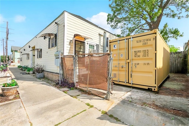 1801 Adams St, New Orleans, LA 70118 - view of front of property featuring a gate