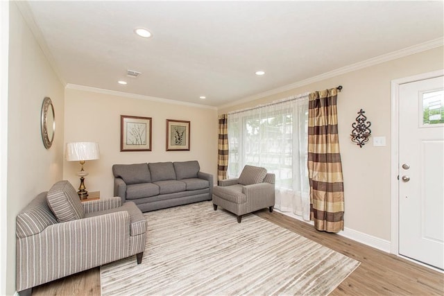 137 Diane Ave, River Ridge, LA 70123 - living room with light wood-style floors, crown molding, and recessed lighting