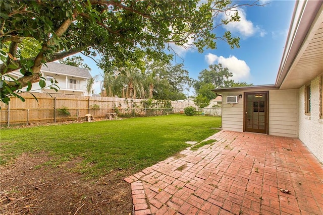 137 Diane Ave, River Ridge, LA 70123 - fenced backyard featuring a patio area and a wall mounted AC
