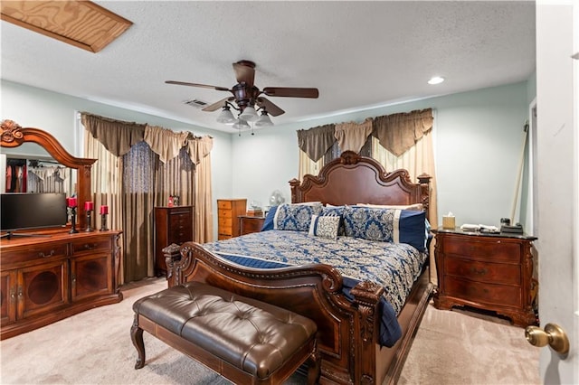 2936 General Ogden St, New Orleans, LA 70118 - carpeted bedroom featuring a textured ceiling, a ceiling fan, and recessed lighting