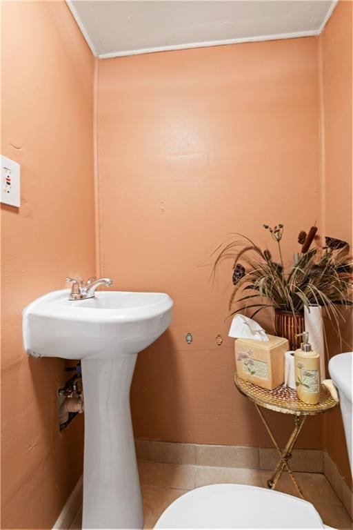 2936 General Ogden St, New Orleans, LA 70118 - bathroom featuring tile patterned flooring and ornamental molding