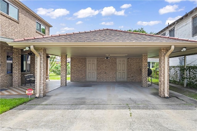 2936 General Ogden St, New Orleans, LA 70118 - view of parking / parking lot featuring driveway and a carport