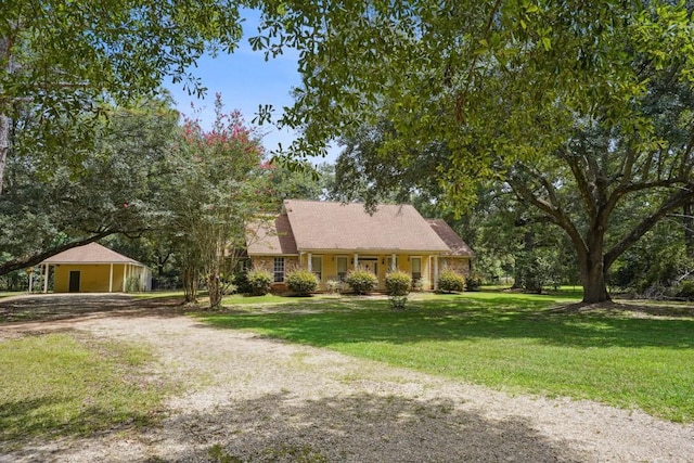 16233 Cody Ln, Covington, LA 70435 - view of front of home featuring dirt driveway, a front lawn, and covered porch