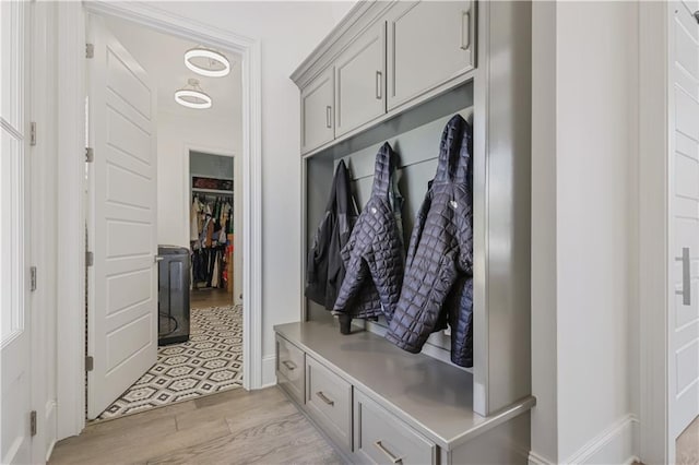 128 Juniper Ct, Mandeville, LA 70471 - mudroom featuring light wood-style floors and baseboards