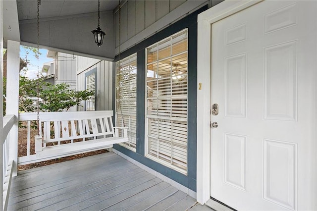 429 Cedarwood Dr Unit 429, Mandeville, LA 70471 - doorway to property with a porch and board and batten siding