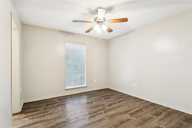 429 Cedarwood Dr Unit 429, Mandeville, LA 70471 - unfurnished room featuring wood finished floors, ceiling fan, and a textured ceiling