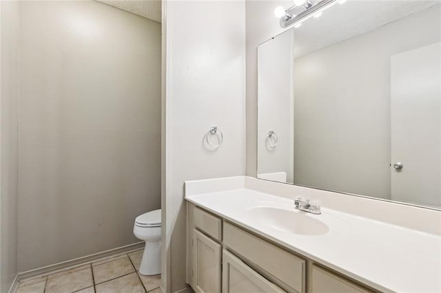 429 Cedarwood Dr Unit 429, Mandeville, LA 70471 - bathroom with vanity, tile patterned flooring, and a textured ceiling