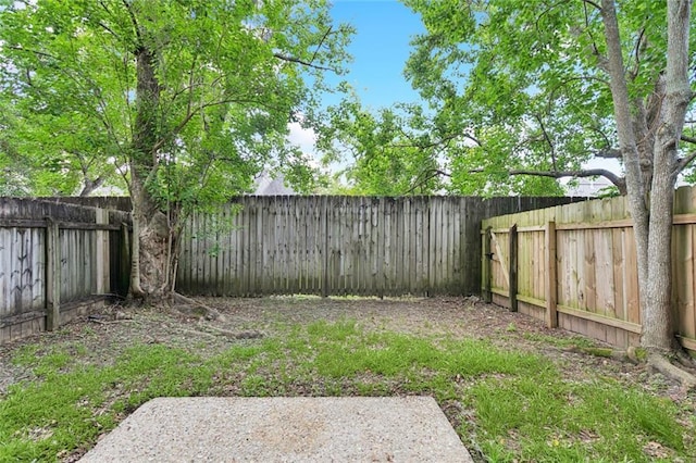 429 Cedarwood Dr Unit 429, Mandeville, LA 70471 - fenced backyard featuring a patio