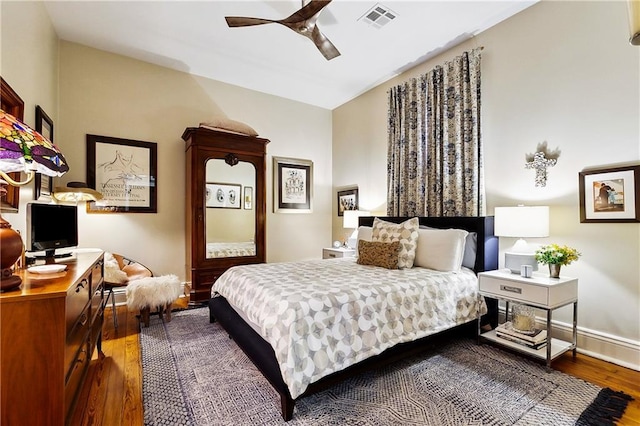 1808 N Rampart St, New Orleans, LA 70116 - bedroom featuring wood finished floors, an office area, and a ceiling fan
