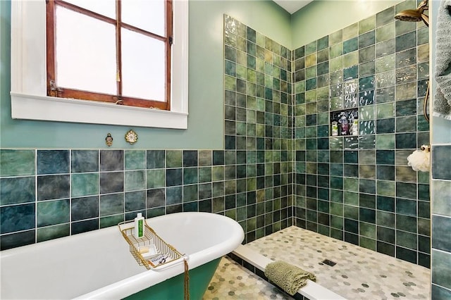 1808 N Rampart St, New Orleans, LA 70116 - full bathroom with tile walls, a soaking tub, and tiled shower