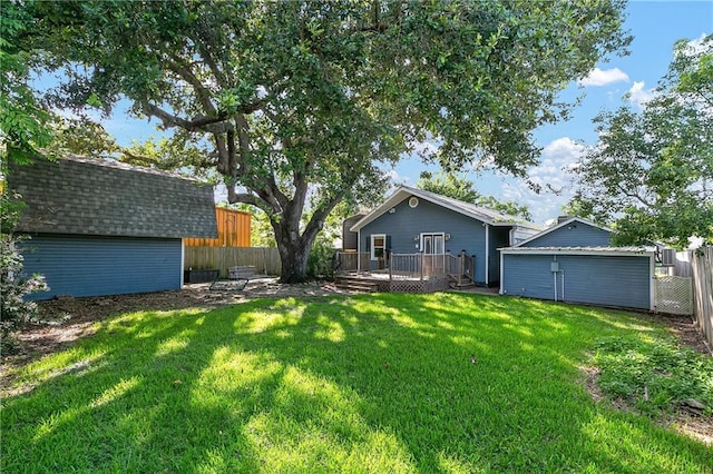 2020 Elm St, Harvey, LA 70058 - fenced backyard with a deck and a storage shed