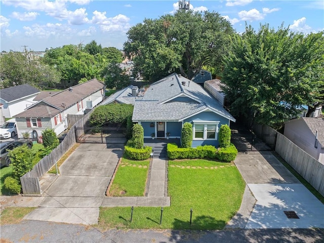 2020 Elm St, Harvey, LA 70058 - view of front of house featuring driveway, a shingled roof, and a residential view