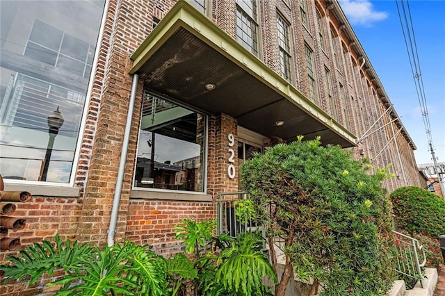 920 Poeyfarre St Unit 161, New Orleans, LA 70131 - view of home's exterior with brick siding