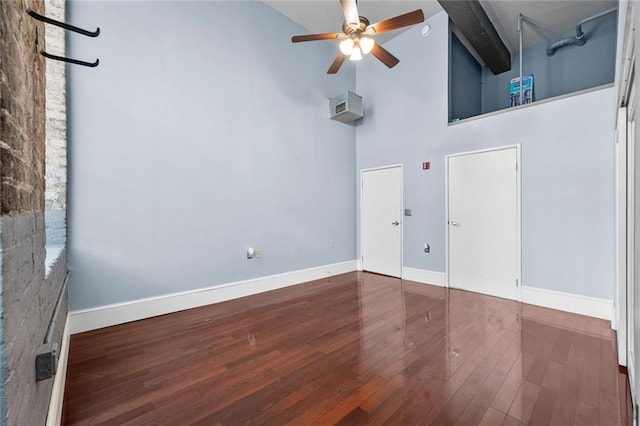 920 Poeyfarre St Unit 161, New Orleans, LA 70131 - empty room featuring high vaulted ceiling, a ceiling fan, wood finished floors, and beamed ceiling