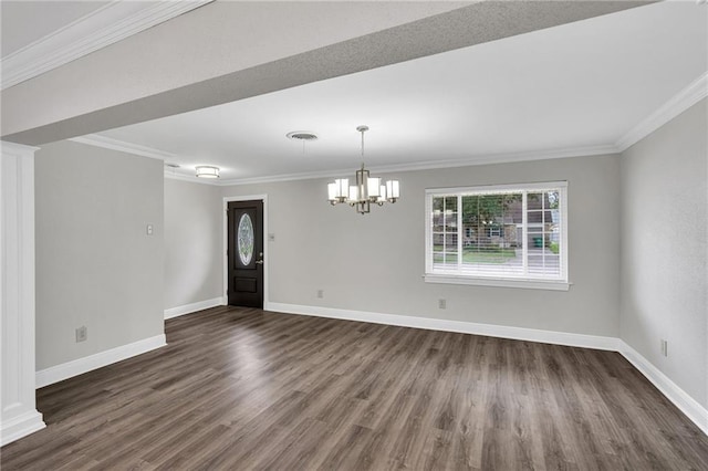 566 Welham Loop, La Place, LA 70068 - entrance foyer featuring a chandelier, healthy amount of natural light, crown molding, and dark wood-style flooring