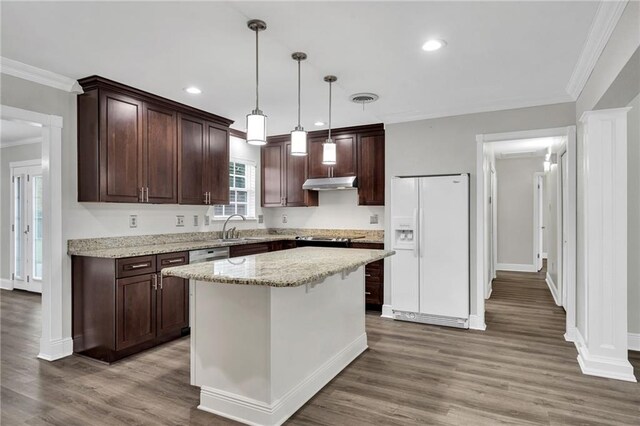 566 Welham Loop, La Place, LA 70068 - kitchen with white fridge with ice dispenser, under cabinet range hood, ornamental molding, dark brown cabinetry, and wood finished floors