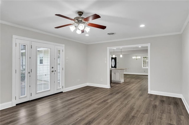566 Welham Loop, La Place, LA 70068 - empty room with dark wood finished floors, ceiling fan, crown molding, and recessed lighting