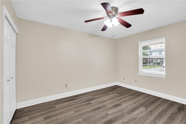 566 Welham Loop, La Place, LA 70068 - unfurnished bedroom with dark wood-style floors, a closet, and ceiling fan
