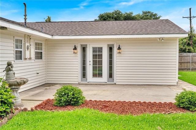 566 Welham Loop, La Place, LA 70068 - entrance to property featuring a patio and roof with shingles