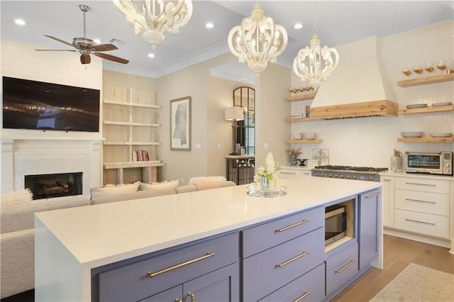 1537 Darlington St, Covington, LA 70433 - kitchen with custom exhaust hood, open shelves, stainless steel appliances, open floor plan, and recessed lighting