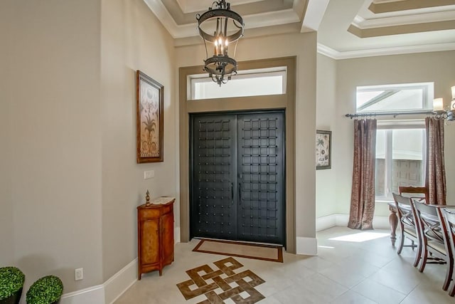 3012 Sunrise Blvd, Slidell, LA 70461 - foyer featuring a raised ceiling, ornamental molding, and a chandelier