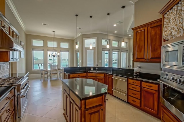 3012 Sunrise Blvd, Slidell, LA 70461 - kitchen featuring appliances with stainless steel finishes, dark countertops, a chandelier, crown molding, and hanging light fixtures