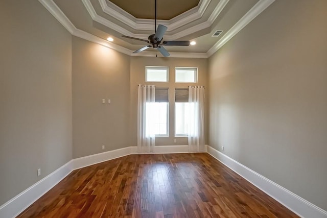 3012 Sunrise Blvd, Slidell, LA 70461 - spare room with a raised ceiling, ornamental molding, dark wood-type flooring, ceiling fan, and recessed lighting