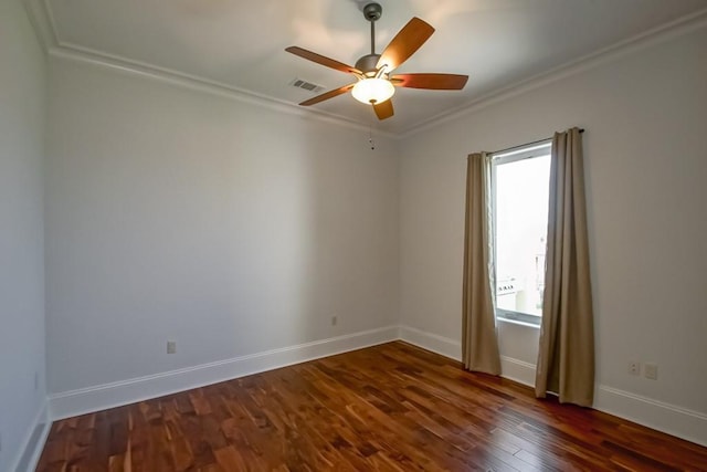 3012 Sunrise Blvd, Slidell, LA 70461 - spare room featuring ornamental molding, a ceiling fan, and dark wood-style flooring