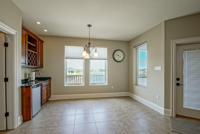 3012 Sunrise Blvd, Slidell, LA 70461 - kitchen with dishwasher, dark countertops, hanging light fixtures, open shelves, and recessed lighting