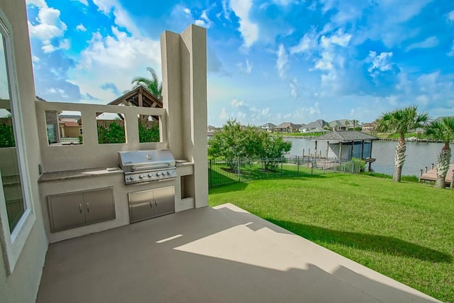 3012 Sunrise Blvd, Slidell, LA 70461 - view of patio / terrace featuring a gazebo, exterior kitchen, a water view, and a residential view