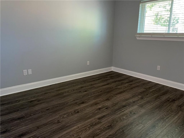 176 Meadowmoss Dr, Slidell, LA 70458 - spare room with dark wood finished floors and baseboards